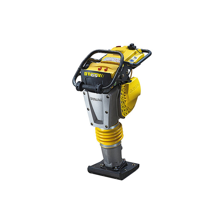 Bomag BT65 Vibrationsstampfer in Gelb-Schwarz mit gefaltetem Federbalg und schwarzer Verdichtungsplatte.